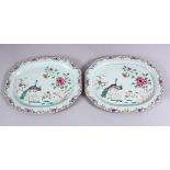 A PAIR OF 18TH CENTURY CHINESE FAMILLE ROSE PORCELAIN SERVING DISHES, each decorated with scenes