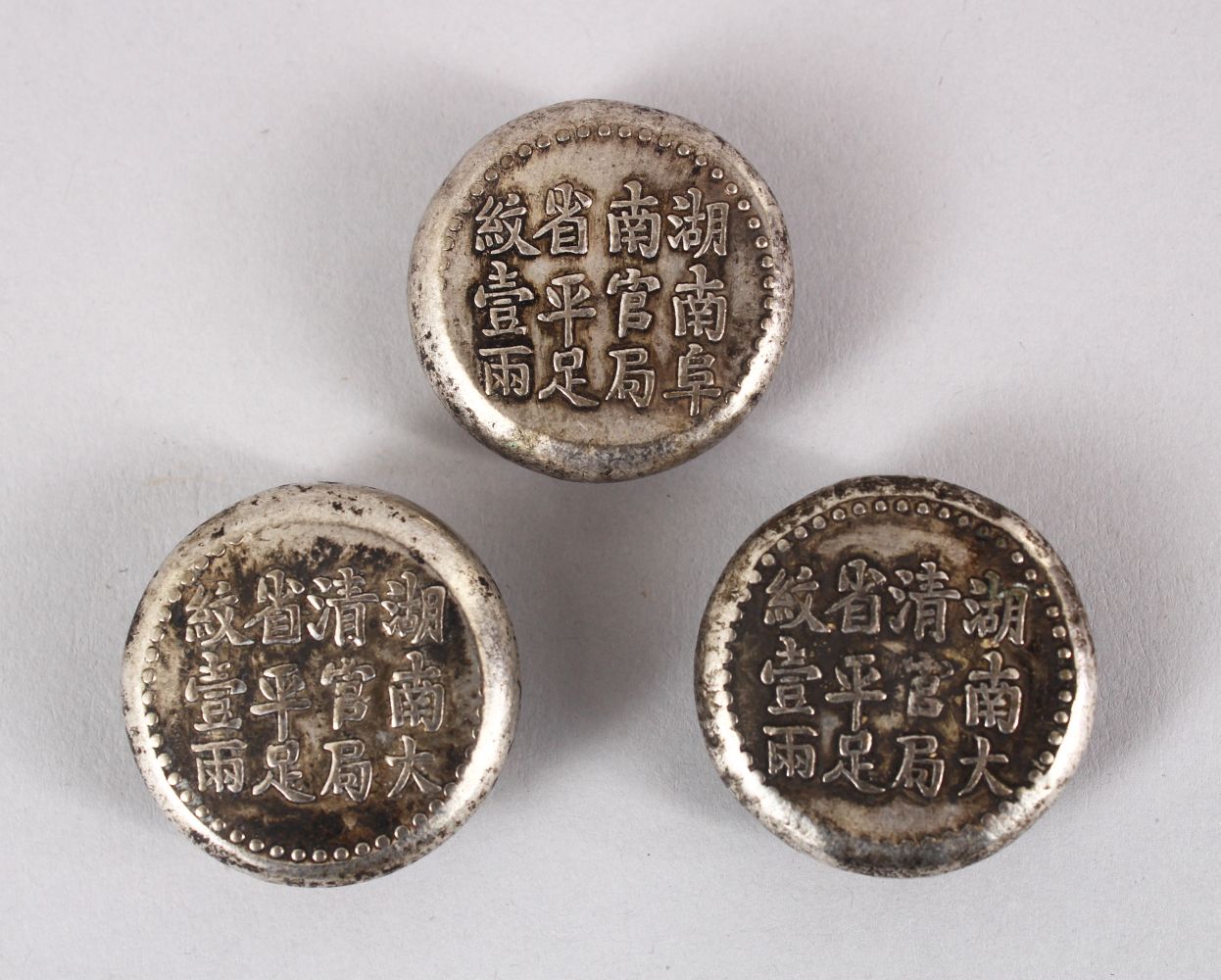 THREE CHINESE SILVERED CALLIGRAPHIC BUTTONS / COUNTERS / WEIGHTS, 3CM.