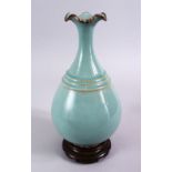 A GOOD CHINESE SONG STYLE RU WARE PORCELAIN VASE & BRONZE STAND, with metal mounts to the vase and a