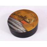 A 20TH CENTURY CHINESE LACQUER CIRCULAR BOX & COVER, decorated with native waterside views , 12cm