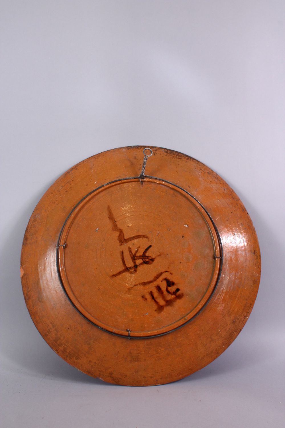 A 19TH CENTURY OR EARLIER INDIAN POTTERY DISH, with poly chrome decoration depicting a multi - Image 5 of 5