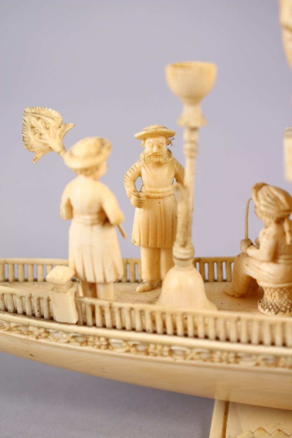 A FINELY CARVED 19TH CENTURY INDIAN IVORY BOAT WITH FISHERMEN, with fine strands of sails, six - Image 8 of 11