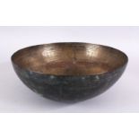 A RARE 9TH / 10TH CENTURY GHAZNAVID PERSIAN BRONZE BOWL, with chased motif decoration, 27cm.