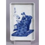A 20TH CENTURY CHINESE BLUE & WHITE PORCELAIN IMMORTAL TRAY, seated at throne, with a crane, 28cm