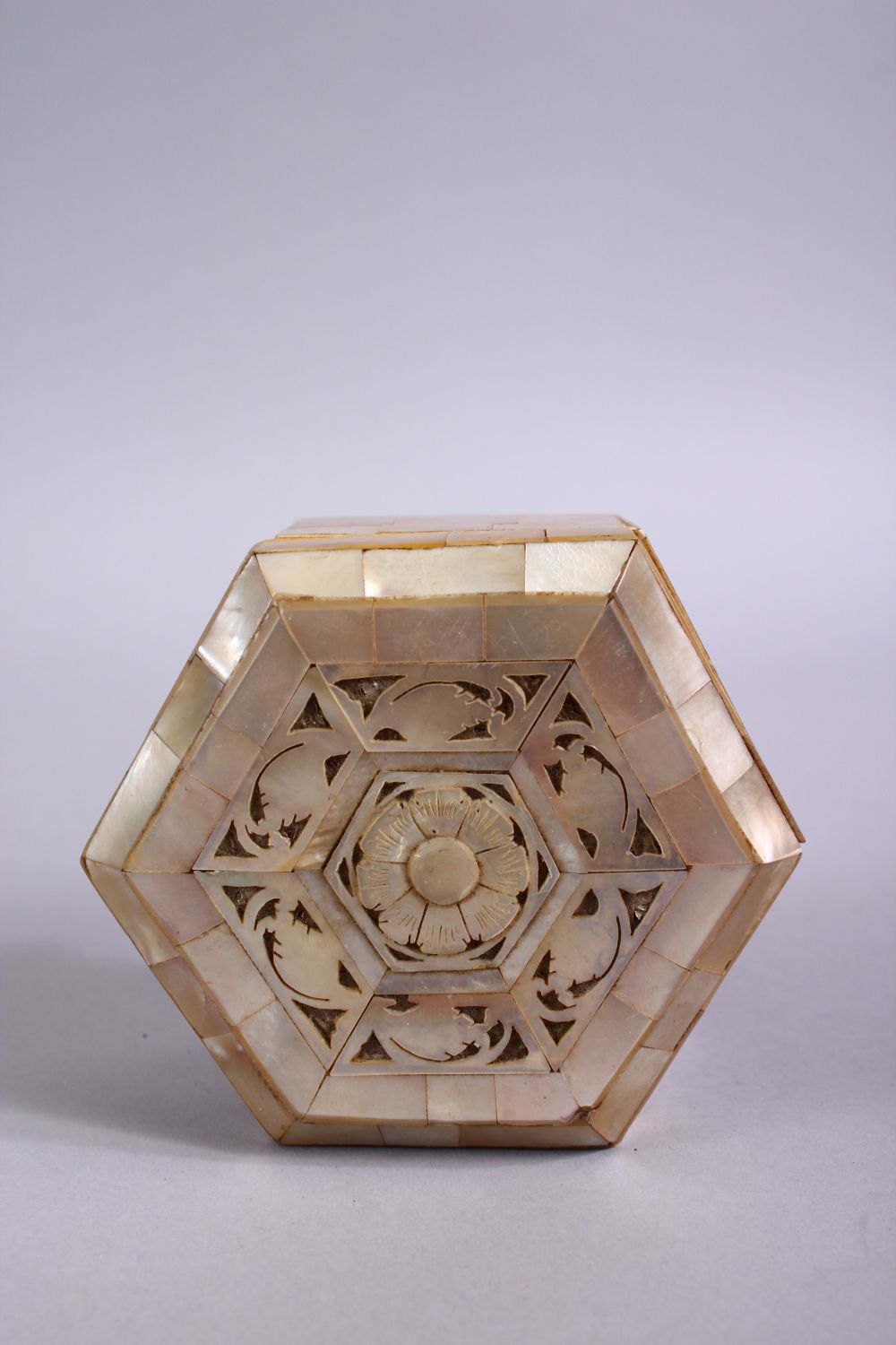 A 19TH CENTURY INDIAN MOTHER OF PEARL LIDDED BOX, the top with carved foliate design, 8cm wide. - Image 3 of 4