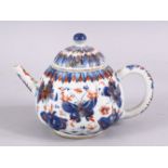 AN 18TH / 19TH CENTURY CHINESE IMARI PORCELAIN TEAPOT, the ribbed body decorated in typical imari