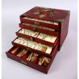 A GOOD CHINESE HARDWOOD & METAL MOUNTED MAHJONG GAMES SET, with five drawers that appear to be