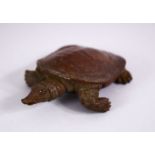 A JAPANESE BRONZE FIGURE OF A TORTOISE, The underside signed, 8.5cm.