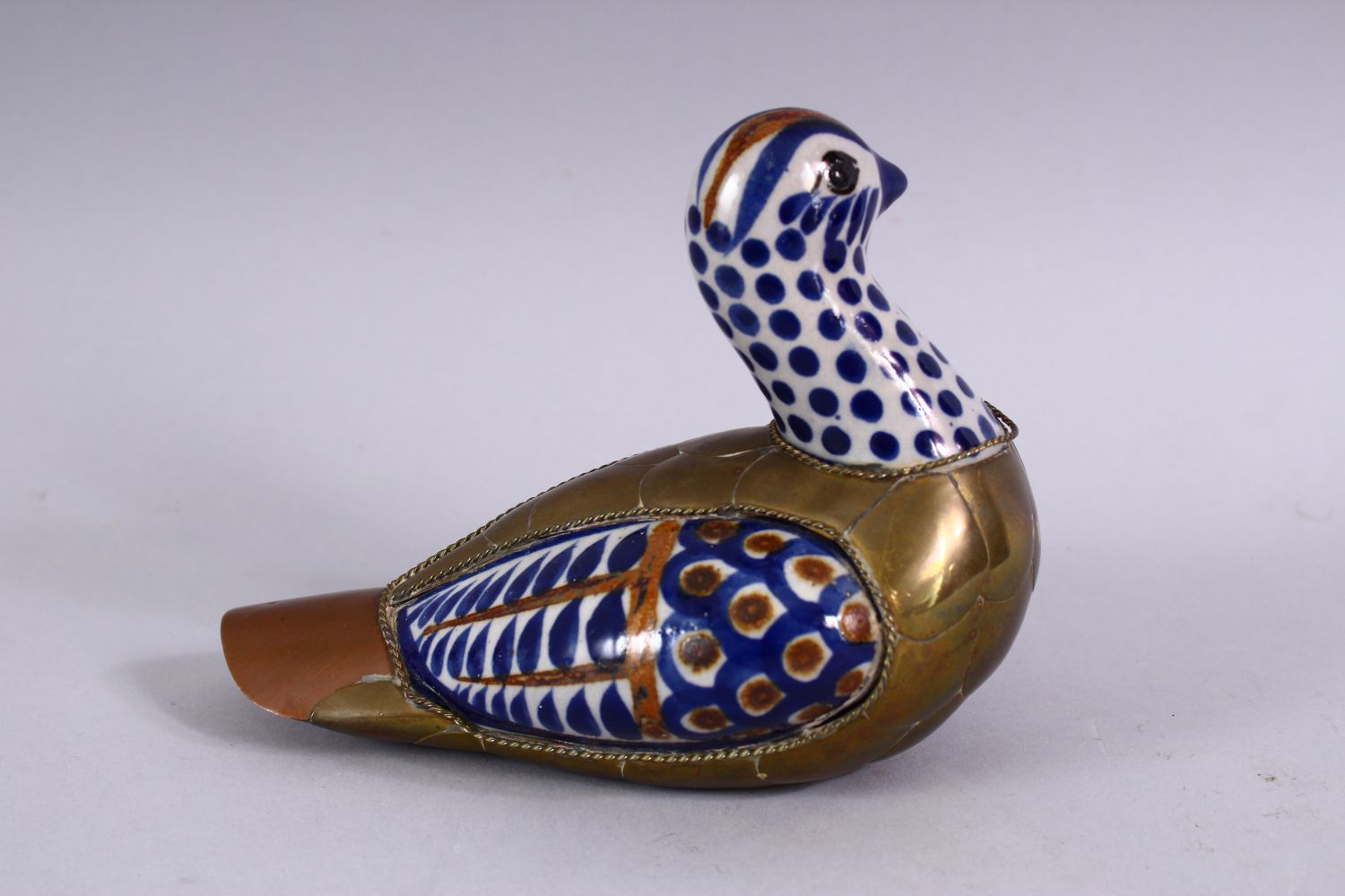 A GOOD ISLAMIC PORCELAIN AND METAL BOUND FIGURE OF A BIRD, the porcelain panels with blue brown - Image 3 of 9