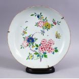 AN 18TH CENTURY CHINESE FAMILLE ROSE PORCELAIN DISH & STAND, decorated with native floral