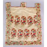 A FINE OTTOMAN GREEN EMBROIDERED SMALL CURTAIN, with profuse floral embroidery display, 66cm high