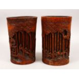 A GOOD PAIR OF 19TH CENTURY CHINESE BAMBOO BRUSH POTS, each decorated in relief to depict working