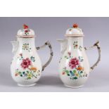 A PAIR OF 18TH CENTURY CHINESE FAMILLE ROSE PORCELAIN COFFEE POTS & COVERS, both decorated with