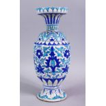 A 19TH CENTURY ISLAMIC BLUE , TURQUOISE AND WHITE POTTERY MULTAN VASE, decorated with blue formal