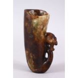 A 20TH CENTURY CHINESE CARVED HARDSTONE LIBATION CUP, carved with the head of a phoenix, 14cm