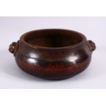 A GOOD HEAVY CHINESE BRONZE TWIN HANDLE CENSER, the censer with twin lion dog mask handles, weight