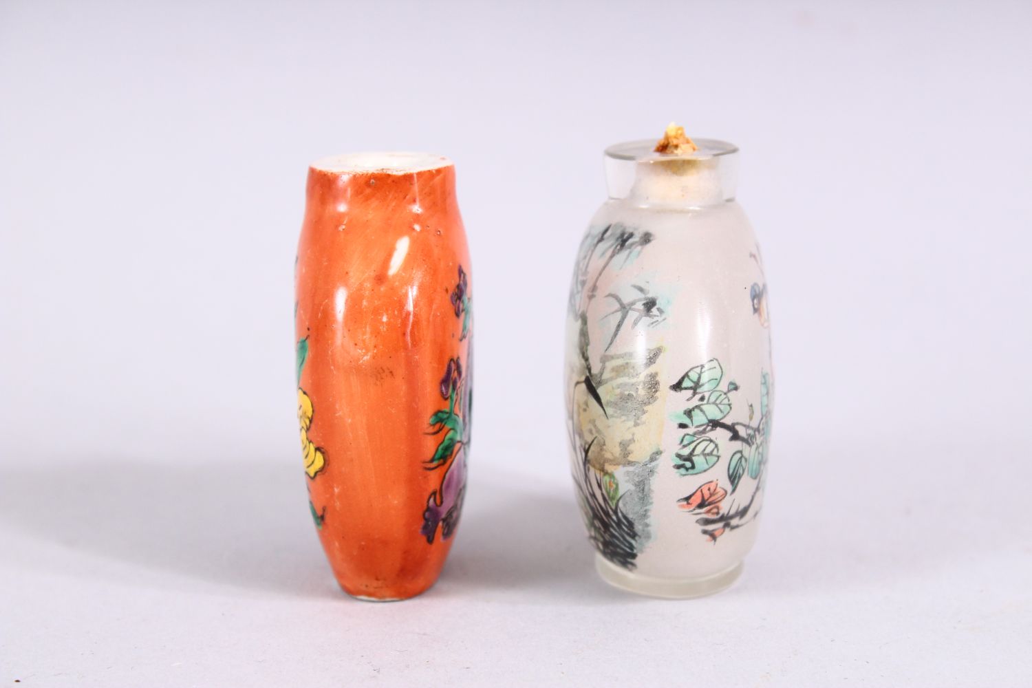 TWO 19TH / 20TH CENTURY CHINESE SNUFF BOTTLES, one porcelain with coral ground and decoration of - Image 2 of 5