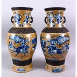 A PAIR OF 19TH CENTURY CHINESE BISCUIT & UNDERGLAZE BLUE PORCELAIN WARRIOR VASES, Decorated with