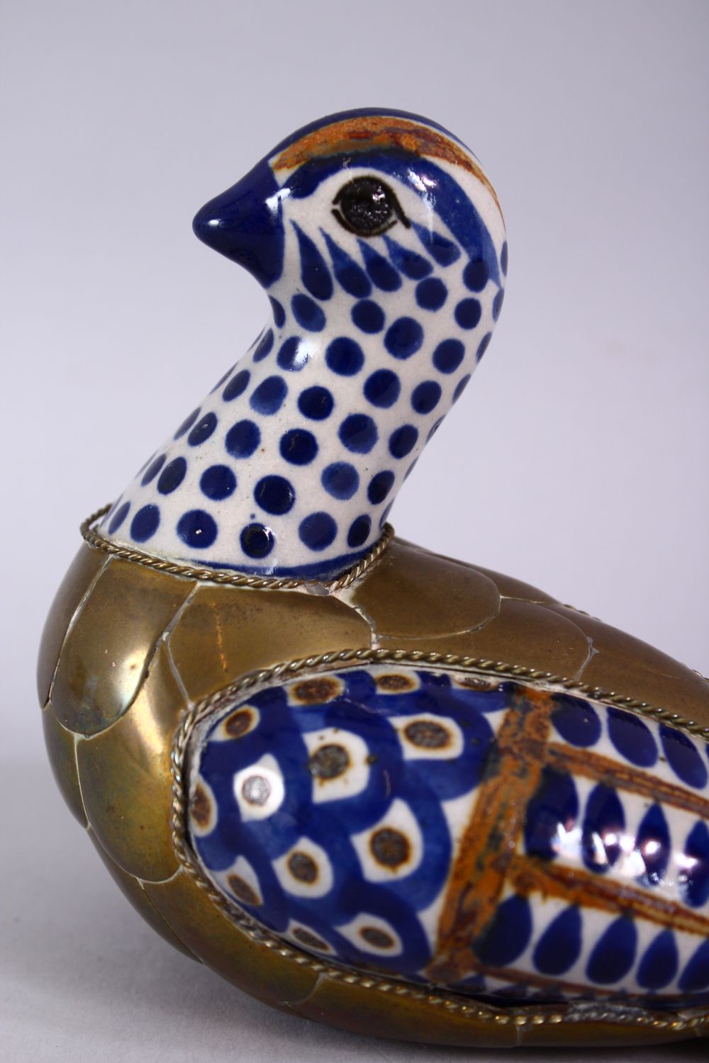 A GOOD ISLAMIC PORCELAIN AND METAL BOUND FIGURE OF A BIRD, the porcelain panels with blue brown - Image 6 of 9