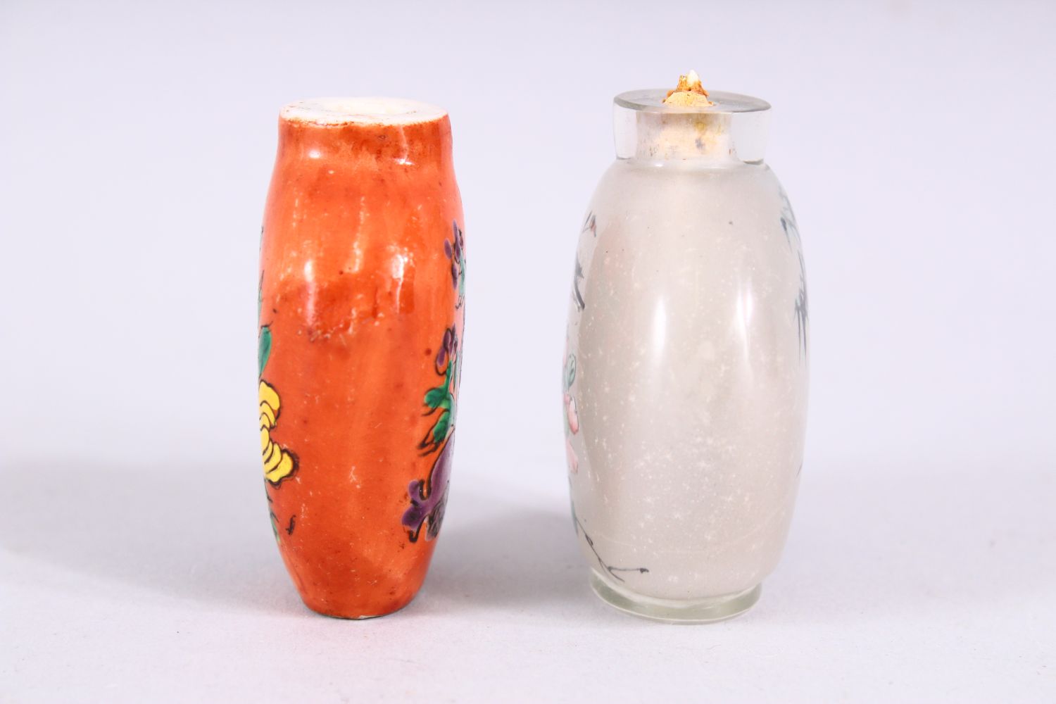 TWO 19TH / 20TH CENTURY CHINESE SNUFF BOTTLES, one porcelain with coral ground and decoration of - Image 4 of 5