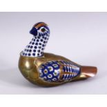 A GOOD ISLAMIC PORCELAIN AND METAL BOUND FIGURE OF A BIRD, the porcelain panels with blue brown