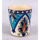 A GOOD TURKISH POTTERY BEAKER, decorated with panel floral design, the base with marks, 10cm.