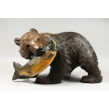 A LARGE JAPANESE KIBORI KUBA CARVED WOODEN FIGURE OF A BEAR, the bear in striding position with a