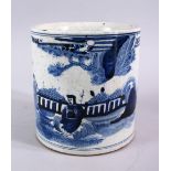 A CHINESE 20TH CENTURY BLUE & WHITE PORCELAIN BRUSH POT, decorated with figure in a landscape