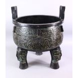 A LARGE AND HEAVY CHINESE WARRING STYLE STATES TRIPOD FORM TWIN HANDLE BRONZE CAST CENSOR, with