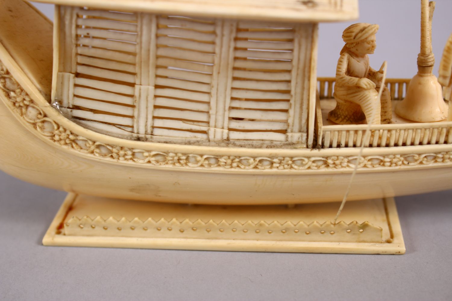 A FINELY CARVED 19TH CENTURY INDIAN IVORY BOAT WITH FISHERMEN, with fine strands of sails, six - Image 10 of 11