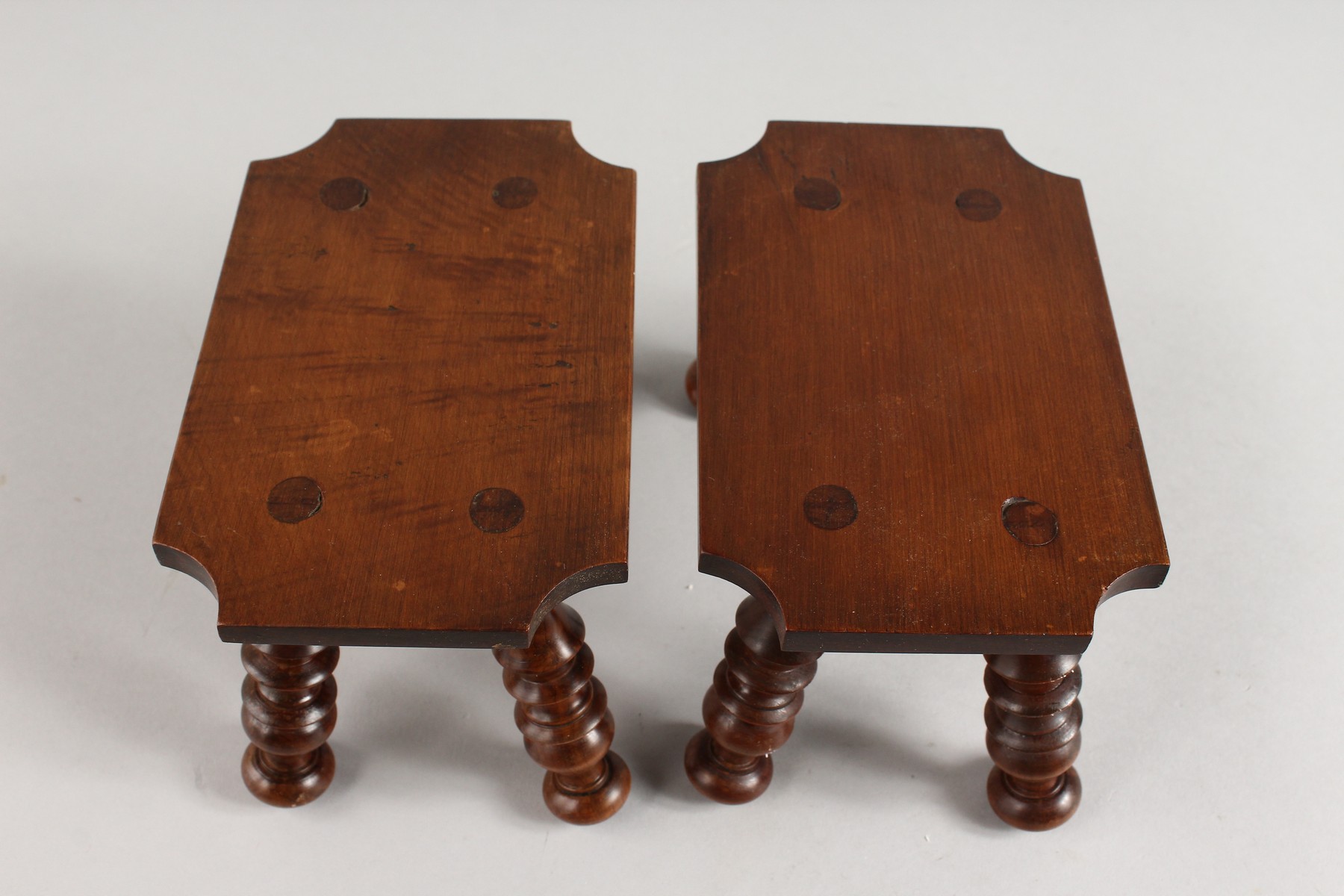 A PAIR OF WOODEN CANDLE STANDS on turned legs. 6ins. - Image 2 of 3