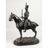 J. R. SKEAPING (1901-1980) ENGLISH A BRONZE GROUP OF A FRENCH HUSSAR ON HORSEBACK, on a marble base.