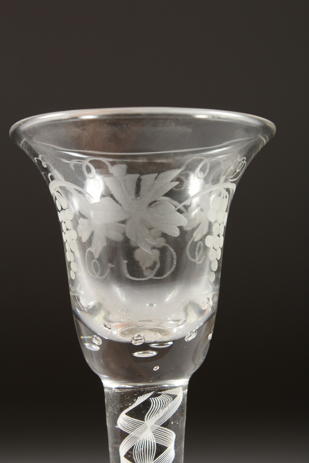 A GEORGIAN WINE GLASS, with inverted bell bowl etched with fruiting vines, with white air twist - Image 5 of 10