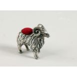 A NOVELTY SILVER RAM PIN CUSHION.