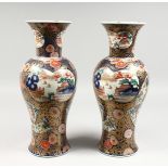A VERY GOOD PAIR OF SAMSON OF PARIS IMARI PATTERN VASES, rich colours, in gilt, reds and blues.