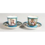 A PAIR OF SEVRES PORCELAIN CUPS AND SAUCERS with portraits and vignettes of flowers