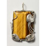 A SILVER AND TIGER'S EYE PENDANT.