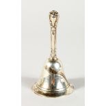 A SMALL SILVER TABLE BELL. 4ins high.