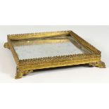 A GOOD 19TH CENTURY FRENCH SQUARE TABLE PLATEAU, with mirrored bottom, gilt mounts and dolphin feet.