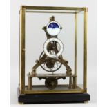 A GOOD, MODERN SKELETON CLOCK WITH MOON PHASE MOVEMENT, in a glass display case. 17.5ins high.