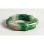 A JADE BAMBOO STYLE BANGLE. 3ins diameter.