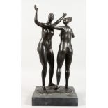 A PAIR OF BRONZE STANDING FEMALE NUDES, arms outstretched, on a marble base. 18.5ins high.