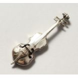 A MINIATURE SILVER VIOLIN.