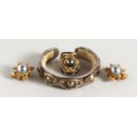 A GOLD, SILVER AND PEARL SET, comprising bangle, ring and earrings.