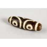 A GOLD INLAID HARD STONE ZHI BEAD.