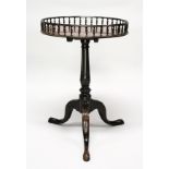 A GOOD GEORGE III CIRCULAR TOP WINE TABLE with pierced gallery, carved column on tripod legs. 2ft