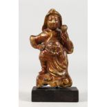 AN EARLY ORIENTAL LACQUERED METAL FIGURE. 6ins high.