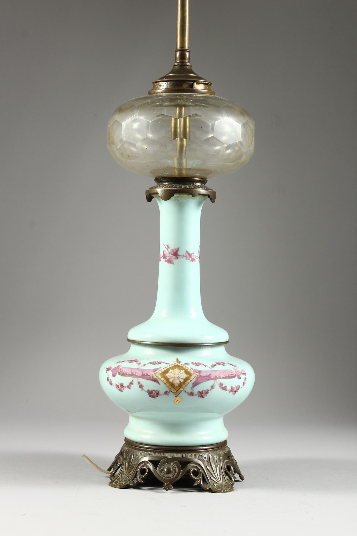 A VICTORIAN OPALINE LAMP with glass reservoir and metal mounts. 26ins high overall. - Image 2 of 7