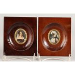 A PAIR OF OVAL PORTRAIT MINIATURES OF YOUNG LADIES in wooden frames. 1.5ins x 1ins.