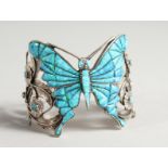 A LARGE HEAVY SOLID SILVER AND REAL OPAL BUTTERFLY BANGLE.